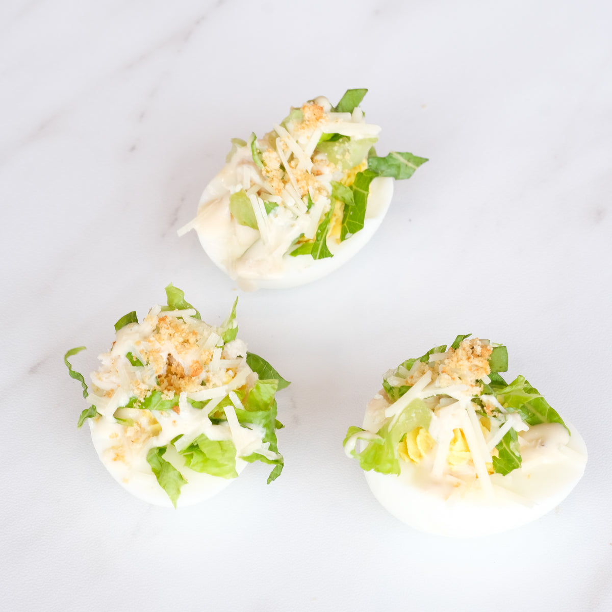 Chicken Caesar Salad Deviled Eggs