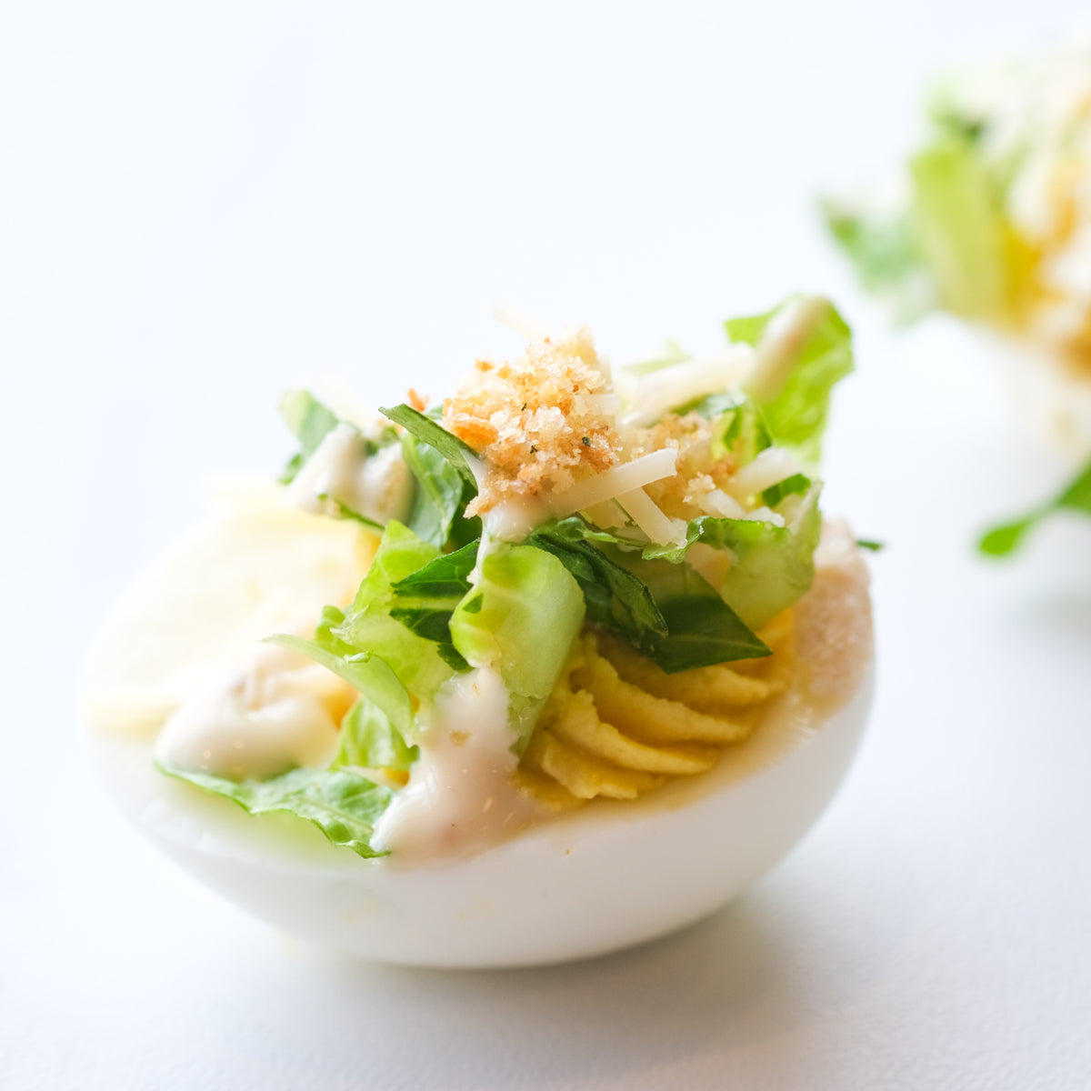 Chicken Caesar Salad Deviled Eggs